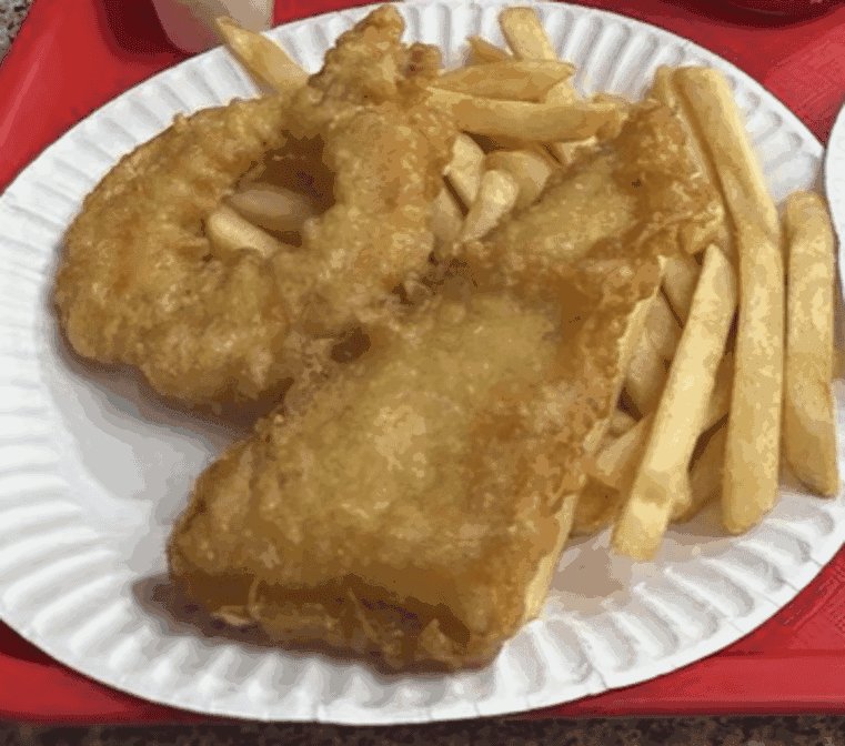 Menu board with fish, shrimp, and side items.
