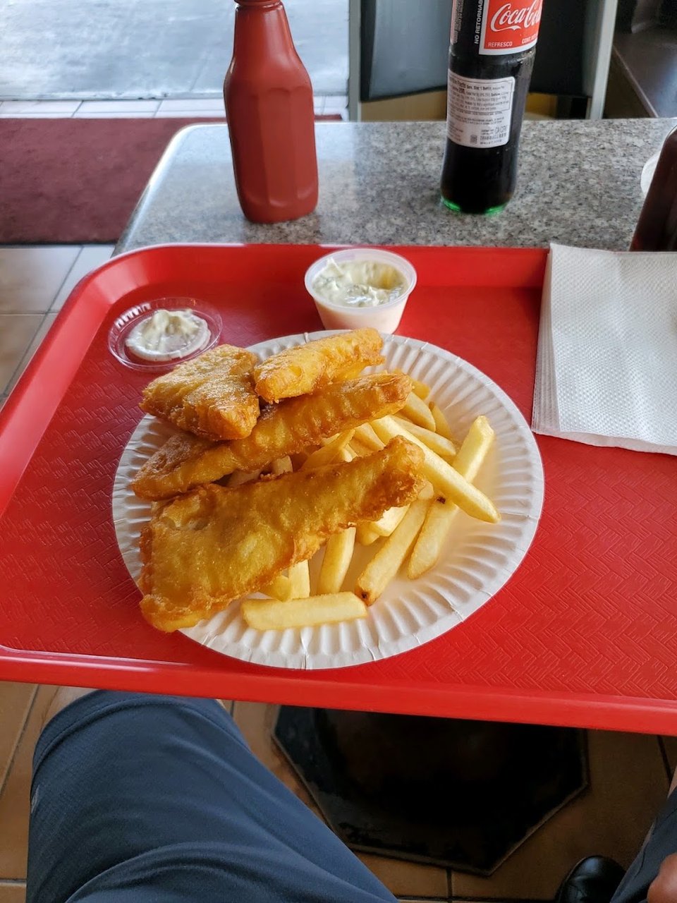 Menu board with fish, shrimp, and side items.