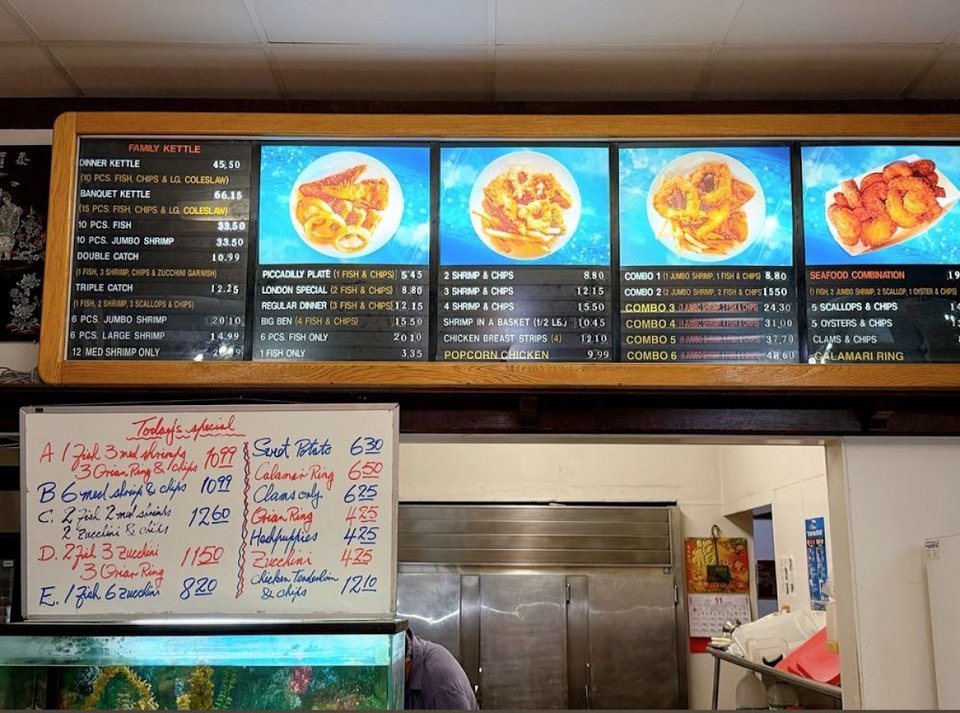 Printed menu showing seafood combos and kettles.