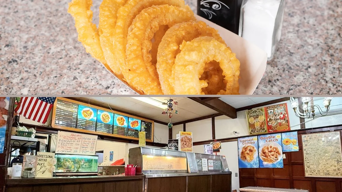 Simple restaurant interior with menu boards above.